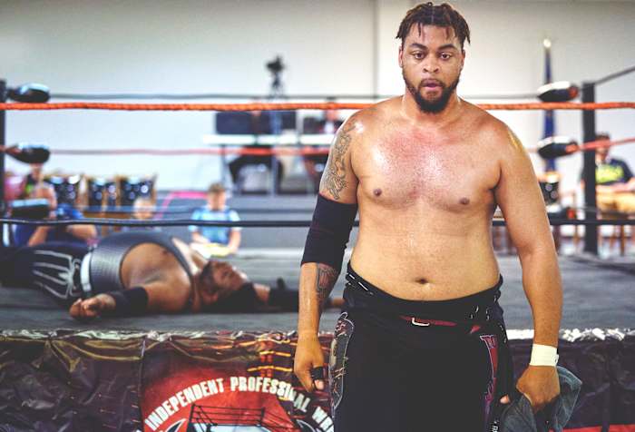 Austin Towers leaves a fallen Ehren Black behind on June 27.